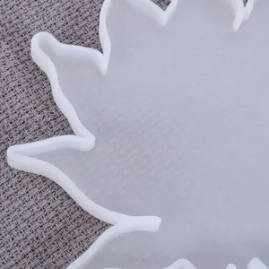 Close-up detail of semi-transparent silicone leaf-shaped resin coaster mold