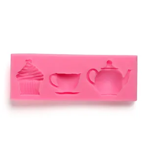 Detail view of pink silicone mold featuring cupcake teacup and teapot shaped cavities