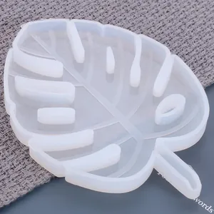 Detailed view of a monstera leaf silicone mold for DIY resin coasters.
