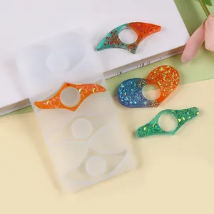 Silicone mold for DIY resin thumb book page holders with sparkling resin samples