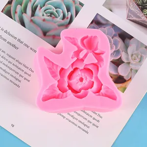 Detailed close-up of a pink floral-shaped silicone mold for aromatherapy plaster