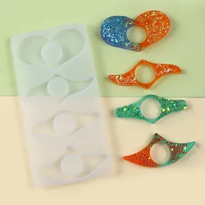 Silicone mold set for DIY resin thumb book page holders with finished examples