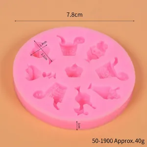 Vista detallada del molde de silicona rosa con formas de helado y piruleta con medidas