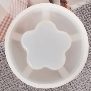 Macro detail of flower-shaped silicone mold for DIY resin ashtray and creative crafts.