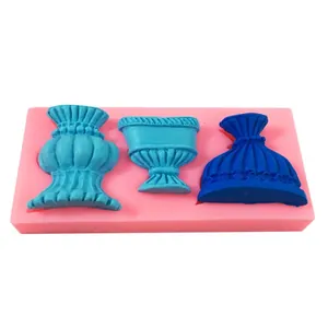 Detail of vintage goblet and vase liquid silicone mold for fondant chocolate cake decor.
