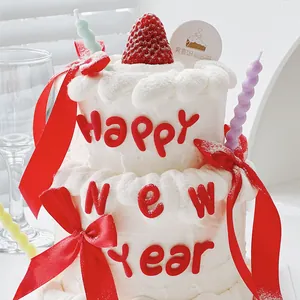 Festive Happy New Year cake decoration set with red soft glue letters and spiral candles