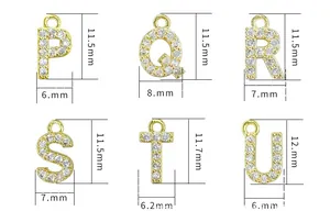Detail view of gold-plated zircon alphabet charms P to U with precise size labels.