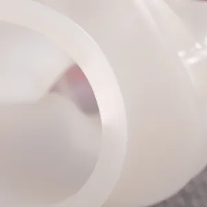 Macro detail of a thick, smooth edge of a white semi-transparent silicone ashtray mold.