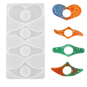 Handmade silicone resin mold for DIY thumb book page holders in heart and wing shapes