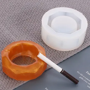 Detailed macro shot of octagonal silicone mold for DIY resin ashtray and its finished version