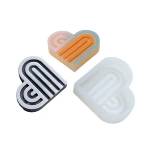 Heart shaped silicone mold with U-shaped rainbow arch pattern for DIY soap and candles