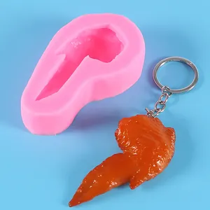 Silicone mold and finished realistic roasted chicken wing keychain detail