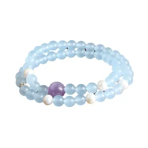 Elegante dubbele streng aquamarijn en kunziet kristallen armband met echte zoetwaterparels
