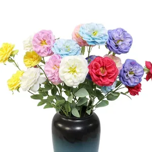 Vibrant multi-colored three-head Austin artificial roses bouquet displayed in a dark vase