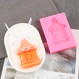 Detailed carousel silicone mold for resin casting and baking ornaments, pink soft silicone.