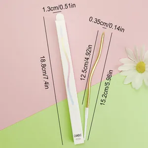 Detail view of a single gold curved birthday candle with precise dimensions