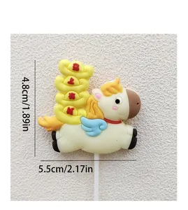 Soft rubber pony cake topper decoration with gold ingots and size markers 4.8cm by 5.5cm