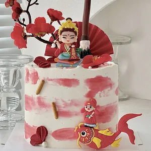 Decoración de pastel de erudito y carpa tradicionales chinos para el éxito escolar