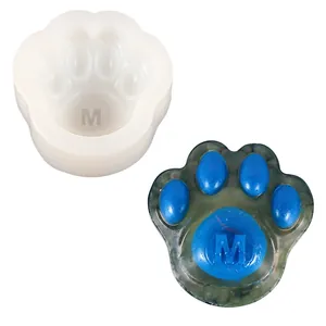 Cat paw silicone mold with letter M for DIY candle soap resin and chocolate making.