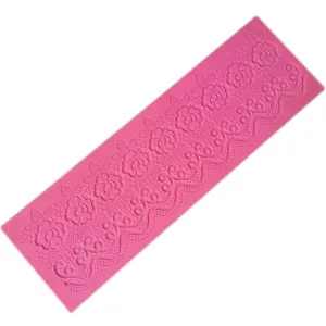 Detailed macro view of pink rose floral lace silicone fondant mold for cake decoration