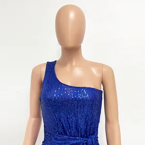 Detailed view of royal blue sequined one-shoulder dress with elegant pleated texture