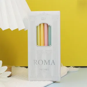 Close-up view of 6-pack colorful spiral cake candles in elegant white Roma box