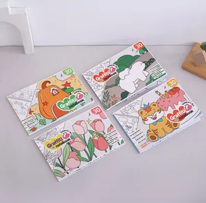 Macro view of four colorful children's graffiti notebooks with different cartoon themes.