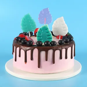 Finished leaf lollipops made from DIY silicone mold displayed as cake decorations