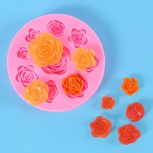 Detailed macro view of pink silicone mold for creating delicate rose-shaped crafts