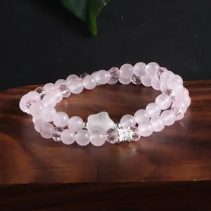 Bracelet à double rang en quartz rose naturel avec breloque étoile blanche sur bois