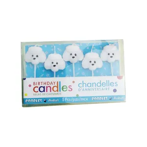 Set of five cute white poodle dog head shaped birthday candles for cake decoration