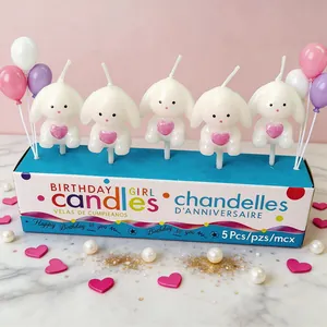 Set of 5 cute white bunny candles with pink hearts for birthday cake decorations.