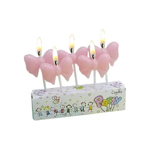 Set of 5 pink pearlized bow candles for cake decoration and party celebration
