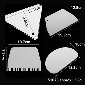 Detailed size measurements of the 4-piece white plastic cake cream and dough scraper set