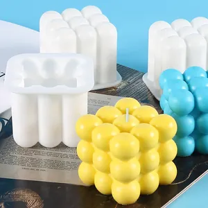 DIY bubble cube silicone mold for handmade candles and soaps with yellow wax sample