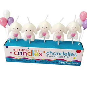 Set of 5 cute white bunny birthday candles with pink hearts for cake decoration.