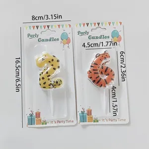 Detail view showing dimensions of leopard number 2 and tiger number 6 birthday candles.