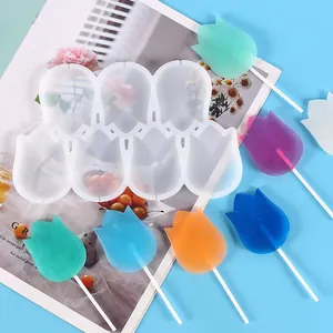 Close-up detail of tulip-shaped DIY silicone mold with colorful finished lollipops