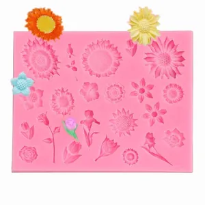 Detailed view of pink silicone mold with various sunflower and daisy patterns