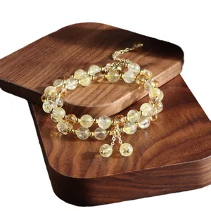 Natural citrine double-strand beaded bracelet with elegant gold tassel and spacers