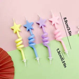 4-pack of colorful spiral star-shaped birthday candles for cake decoration