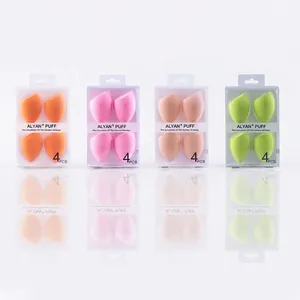 Set of 4 slanted makeup blending sponges in orange, pink, beige, and lime green.