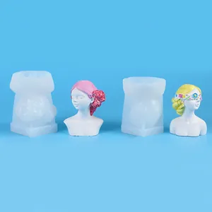 High-detail view of DIY silicone molds alongside finished floral girl bust sculptures