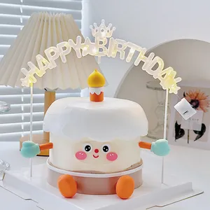 Creative LED Happy Birthday cake topper featuring glowing warm white letters and a crown