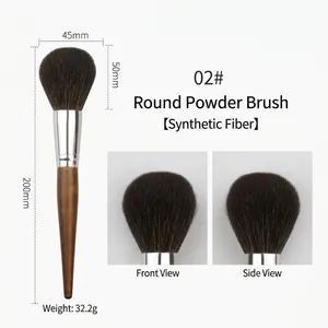 Detailed view of round powder brush showing 200mm length and soft fiber bristles