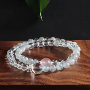 Detail view of double-layer bracelet with gray moonstone and clear crystal beads.