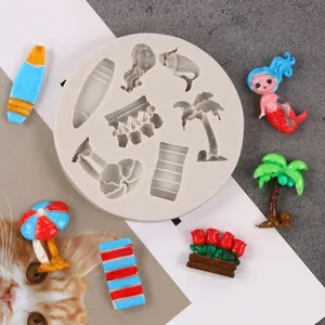 Round silicone mold for DIY beach-themed resin crafts with mermaid and palm tree shapes