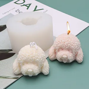 Close-up of silicone mold and finished teddy dog head candles for home decoration
