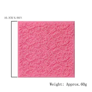 Intricate pink floral lace silicone mold for fondant cake decoration, square mat design.