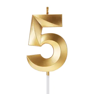 Elegant gold number 5 birthday candle with geometric 3D faceted design for cake decor